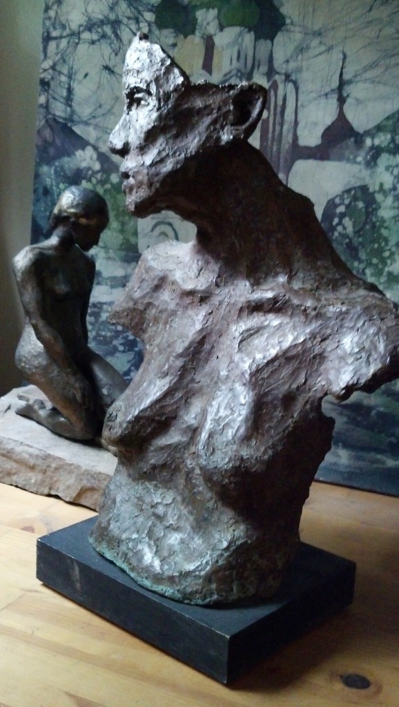 torso - side view with seated bronze behind
